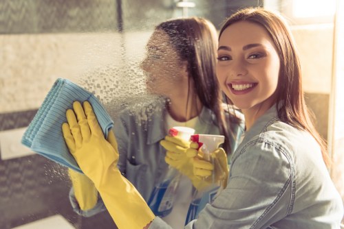 Cleaner wearing PPE during a carpet cleaning job in Brentford